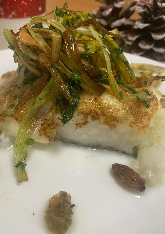 Una foto de Bacalao gratinado