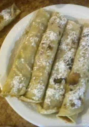 Una foto de Panqueques rellenos con dulce de leche y nueces