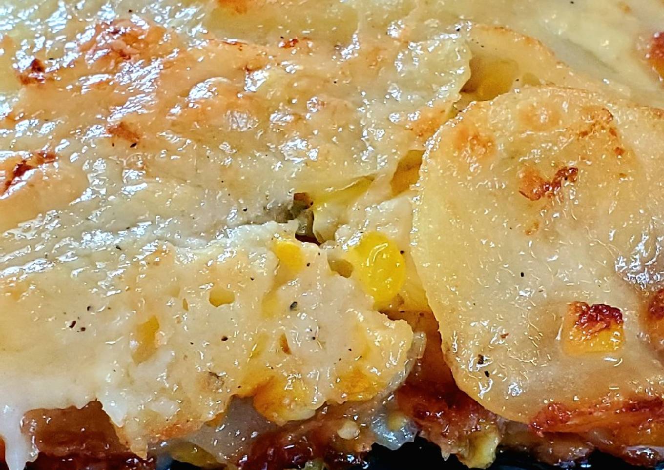 Jalapeno Corn Scalloped Potatoes with garlic and lime bechamel