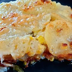 Jalapeno Corn Scalloped Potatoes with garlic and lime bechamel A picture of Jalapeno Corn Scalloped Potatoes with garlic and lime bechamel.