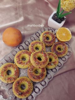 عکسی از دستور دونات پرتقالی در فر 🍊 با سس پرتقالی