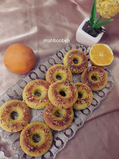 عکسی از دستور دونات پرتقالی در فر 🍊 با سس پرتقالی