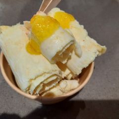 Pineapple vanilla ice cream roll A picture of Pineapple vanilla ice cream roll.