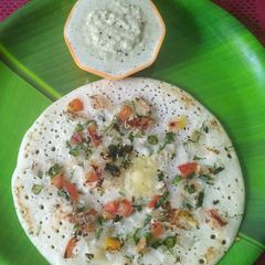 A picture of Onion tomato uttapam.