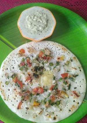 A picture of Onion tomato uttapam.
