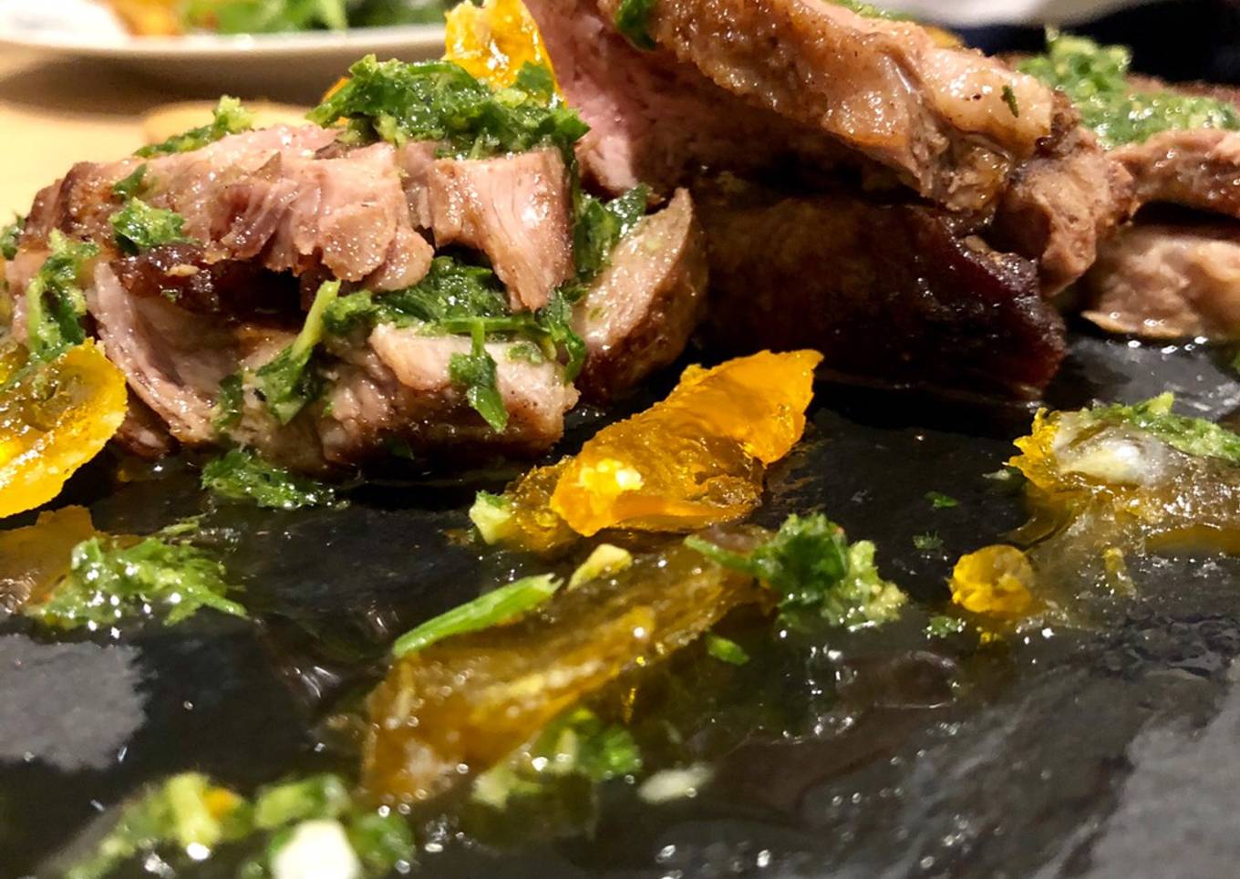 Iberico Pork Pluma with shards of salt cured egg yolk and smoked chimmi churri sauce