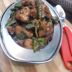 A picture of Leftover spicy chilli idly.