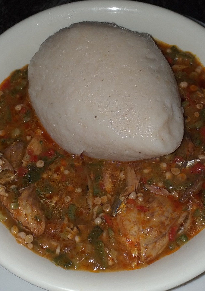 A picture of Maize and cassava swallow with okro soup.