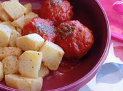 Una foto de pollo entomatado con papa