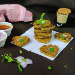 A picture of Moong dal poha tikki heart's.
