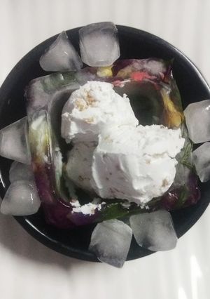 A picture of Peanut Ice cream with a hint of chilli(served in ice bowl).