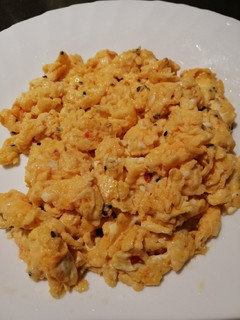 A picture of Scrambled Egg with Chili Sauce.