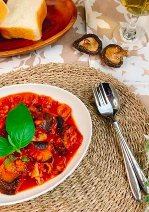 A picture of Eggplant and tomato stew with Shiitake powder.