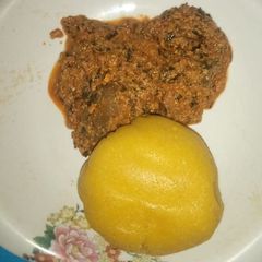 A picture of Eba with egusi soup.
