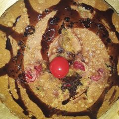 A picture of Sweet red cherry plum cake.