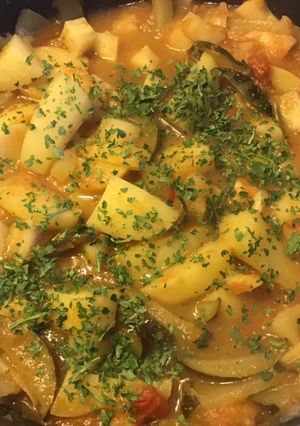 Une photo de Mijoté de céleri rave courgette tomates pommes de terre et citron confit