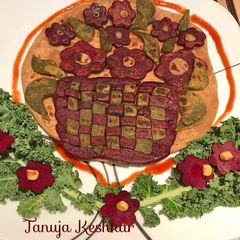 A picture of Kele,spinach,beetroot quinoa,oatmeal paratha.