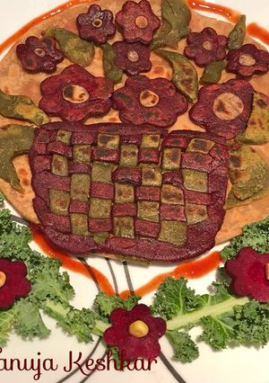 A picture of Kele,spinach,beetroot quinoa,oatmeal paratha.