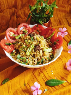 A picture of Tomato pulao/ Tomato Rice 🍚.