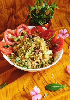 A picture of Tomato pulao/ Tomato Rice 🍚.