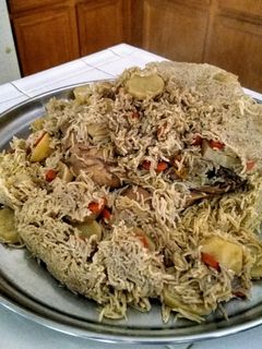 صورة لوصفة مقلوبة دجاج مع زهره وبطاطا