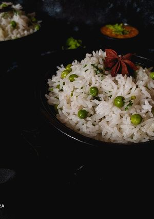 A picture of Jeera Matar Pulao.