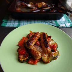 A picture of Oven baked veg & bangers.