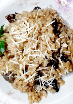 Una foto de Risotto de hongos de pino