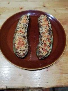 Una foto de Calabacines rellenos de setas de chopo y langostinos