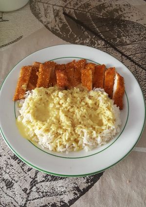 Una foto de Arroz con pollo al curry