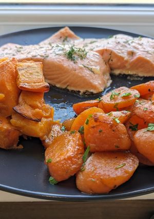A picture of Buttery Salmon with Sweet Potatoes and Carrots.