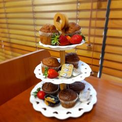 A picture of Banana and strawberry muffins.