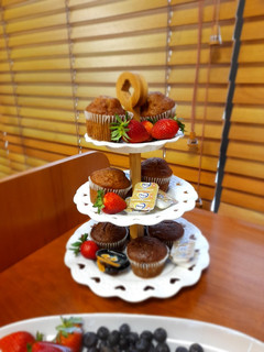 A picture of Banana and strawberry muffins.