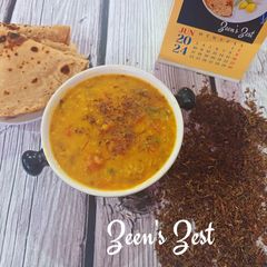 A picture of Hyderabadi Chugur Khatti Daal or Tender Tamarind Leaves Khatti Daal for lunch.