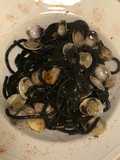 Spaghetti al nero di seppia risottati con i caperozzoli (lupini)