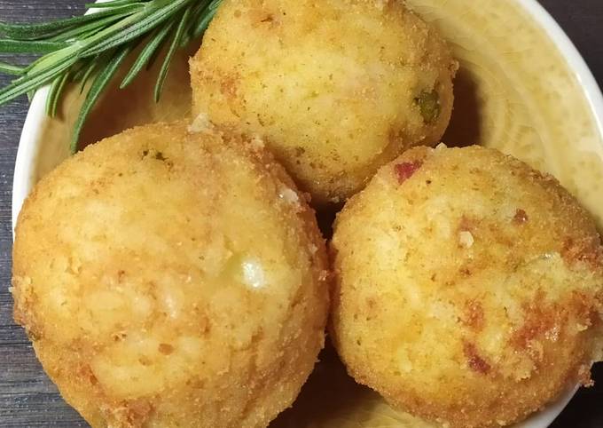 Arancini di riso aromatizzati alla curcuma