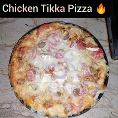 Chicken Tikka Pizza 🍕 A picture of Chicken Tikka Pizza 🍕.
