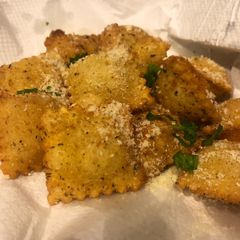 A picture of Four cheese fried ravioli.