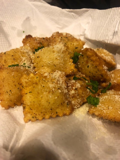 A picture of Four cheese fried ravioli.