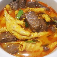 A picture of Chicken Feet and Fermented Bamboo Shoot Red Curry.
