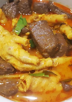 A picture of Chicken Feet and Fermented Bamboo Shoot Red Curry.