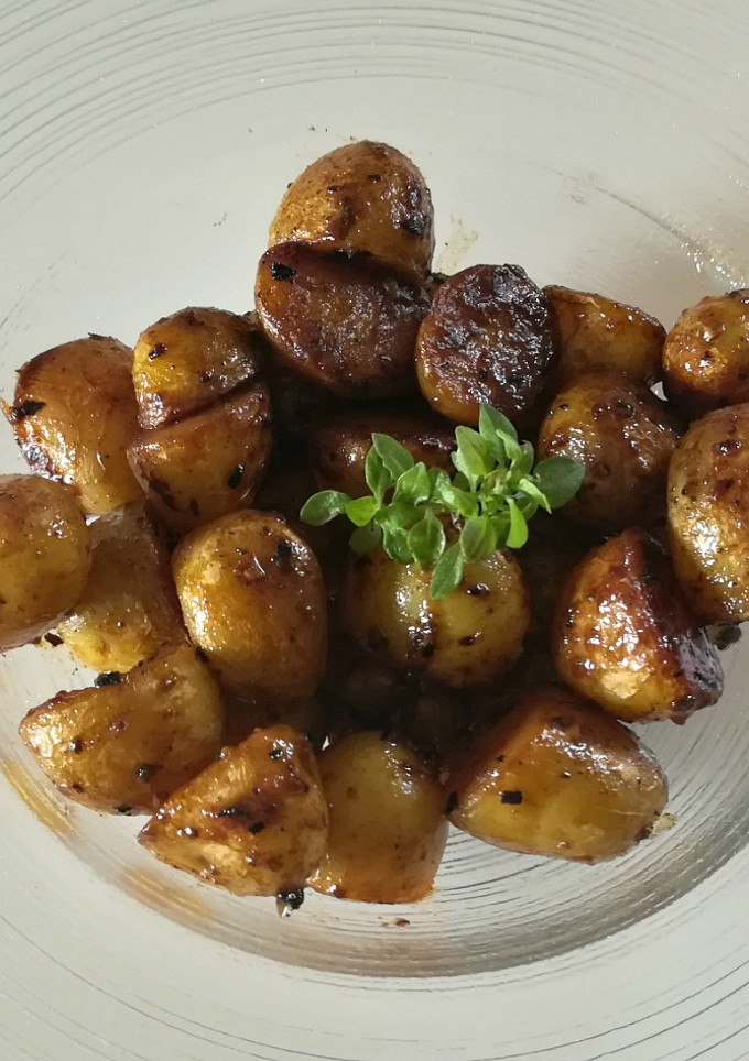 Una foto de Patatas baby al ajo y limón
