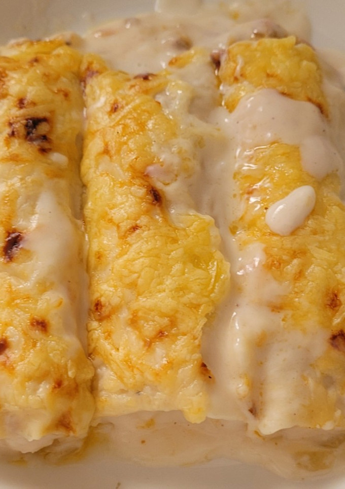 Una foto de Canelones de dorada y langostinos. Riquísimos y de categoría