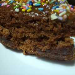 Una foto de Torta vegana de cacao y naranja
