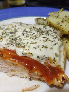 Una foto de Pollo a la pizza