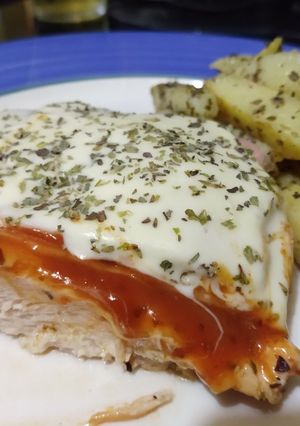 Una foto de Pollo a la pizza