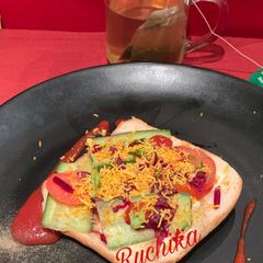 A picture of Cucumber-Tomato sandwich.