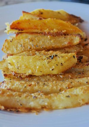 Una foto de Papas a la parmesana
