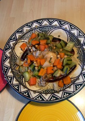 Une photo de Couscous au poulet et merguez