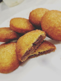 A picture of Chocolate filled donuts.